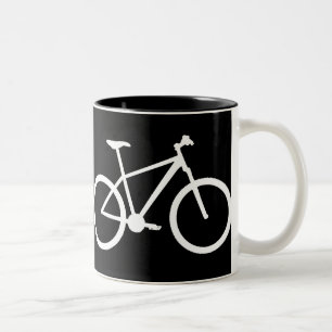 Weiße Mountainbike auf schwarzem Becher Zweifarbige Tasse