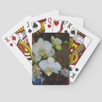 Weiße Orchideen spielen Karten
