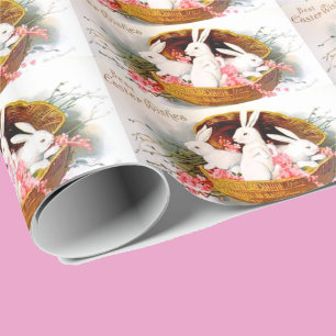 Weiße Osterhasen in einem Korb Geschenkpapier