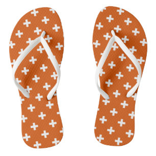 Weiße Polka-Kreuze auf verbrannter Orange Flip Flops
