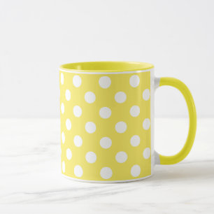 Weiße Polka-Punkte auf dem gelben Mais-Hintergrun Tasse