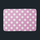 Weiße Polka-Punkte auf hellrosa Badematte<br><div class="desc">Weiße Polka-Punkte auf hellrosa</div>