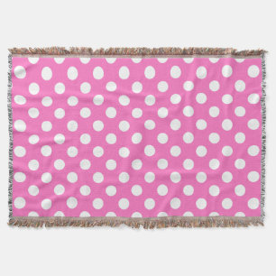 Weiße Polka-Punkte auf rosa Decke