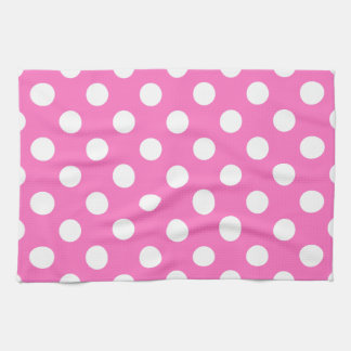 Weiße Polka-Punkte auf rosa Geschirrtuch