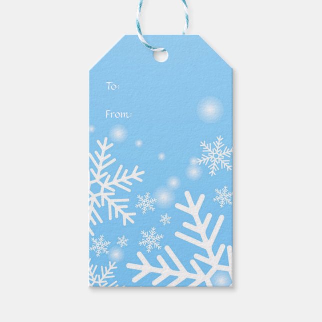 Weiße Schneeflocken auf blauen Weihnachtsmarken Geschenkanhänger (Vorderseite)