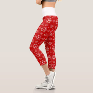Weiße Schneeflocken auf dem Roten Hintergrund Weih Capri Leggings
