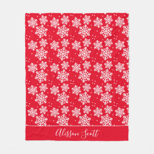 Weiße Schneeflocken auf der Red Fleece Blanket