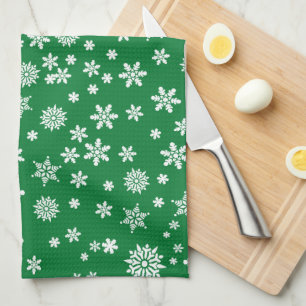 Weiße Schneeflocken auf grünem Weihnachten Geschirrtuch