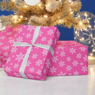 Weiße Schneeflocken auf rosa Wintermuster Geschenkpapier