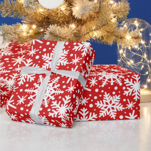 Weiße Schneeflocken in Rot Geschenkpapier