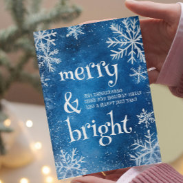 Weiße Schneeflocken und blauer Merry und hell Feiertagskarte