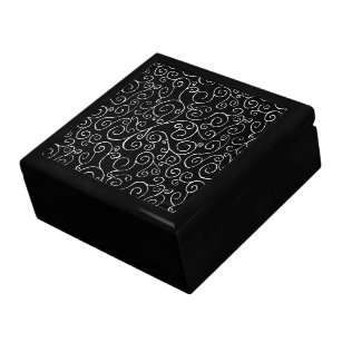 Weiße Scrollbahnen auf schwarz Geschenkbox