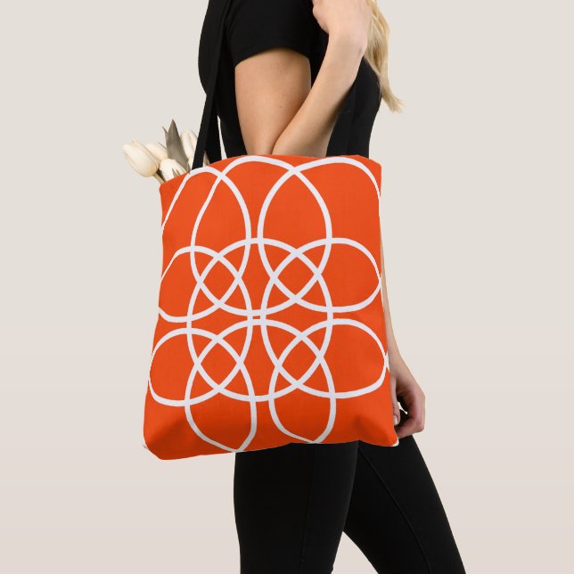 Weiße Spiralkreise auf hellen Orangen Tasche (Von Nahem)