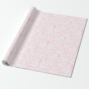 Weiße Spitze auf Rosa Geschenkpapier