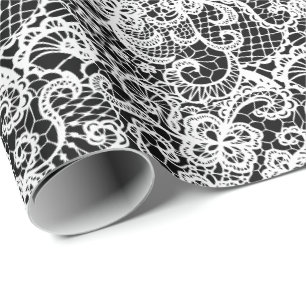 Weiße Spitze auf schwarz Geschenkpapier