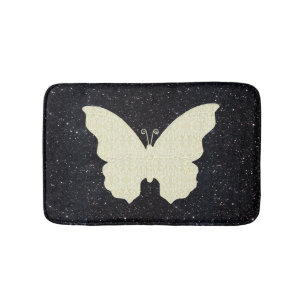 Weiße Spitzen-Schmetterling auf schwarzer Glitter- Badematte