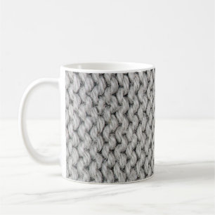 Weiße Strickwollestruktur, nahes Foto. Kaffeetasse