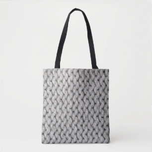 Weiße Strickwollestruktur, nahes Foto. Tasche
