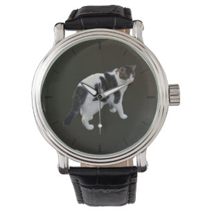 Weiße Tablette mit dunklen Pflastern Armbanduhr