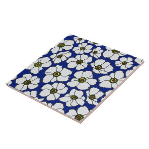 Weiße tropische Blumen auf Blau Fliese