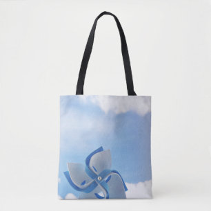 Weiße und blaue Handwindmühle unter bewölktem Himm Tasche