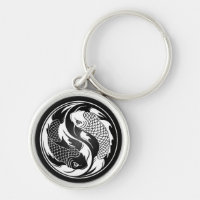 Weiße und schwarze Yin Yang Koi Fische
