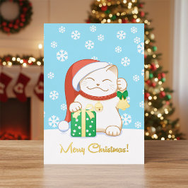 Weiße Weihnachtskatze in einem Red Hat Folien Feiertagskarte