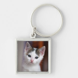 Weißer gepunkteter Kitty Schlüsselanhänger