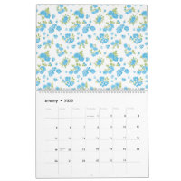 weißer Hintergrund mit blauen Blumen und grünem Le