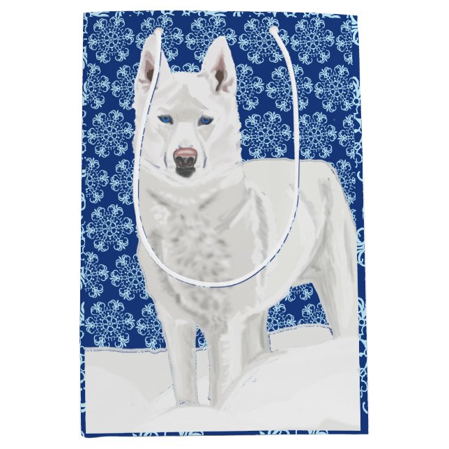 Weißer Husky gegen Schneeflocken und dunkelblauer  Mittlere Geschenktüte (Vorderseite)