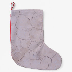 WEISSER KONKRETER BODEN KLEINER WEIHNACHTSSTRUMPF