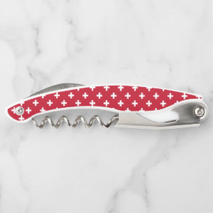Weißer Polka kreuzt auf rot Kellnermesser