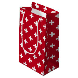 Weißer Polka kreuzt auf rot Kleine Geschenktüte