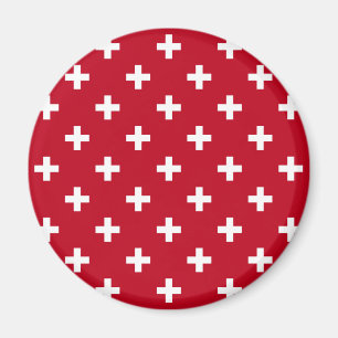 Weißer Polka kreuzt auf rot Magnet