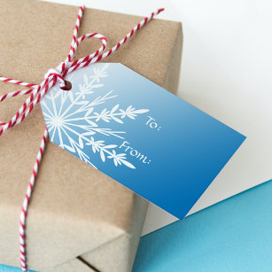 Weißer Schneeflocken auf blau Geschenkanhänger