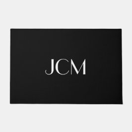 Weißes Anfangsmonogramm auf schwarz Fußmatte