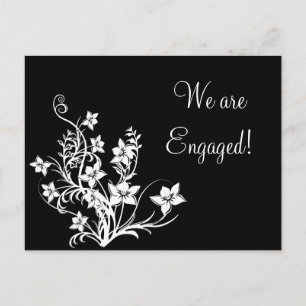 Weißes Blumenmuster auf schwarzen Postkarten