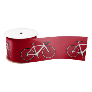 Weißes Fahrrad auf Red Satin Ribbon Satinband