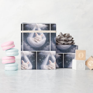 Weißes Kaninchen, das an einer Tüll-Hängematte hän Geschenkpapier