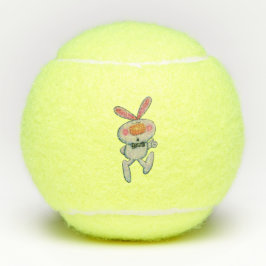Weißes Kaninchen Orangennase wirbelt schwarze Kraw Tennisbälle