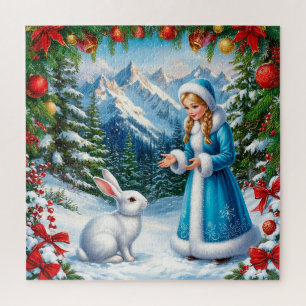 Weißes Kaninchen und Schneemädchen im winterlichen