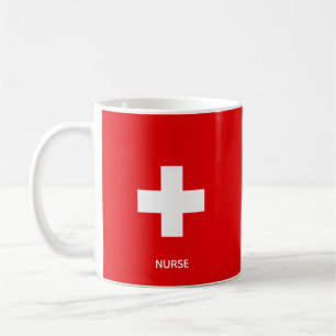 Weißes Kreuz, goldener Caduceus und Text einer Pfl Kaffeetasse