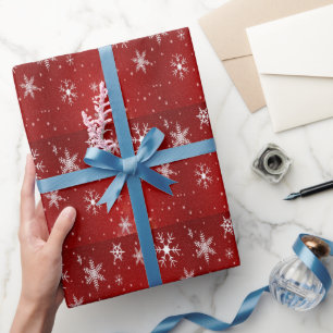 Weißes Schneeflocken und rotes Hintergrundpapier Geschenkpapier