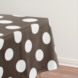 Weißpolka-Punkte auf braun Tischdecke