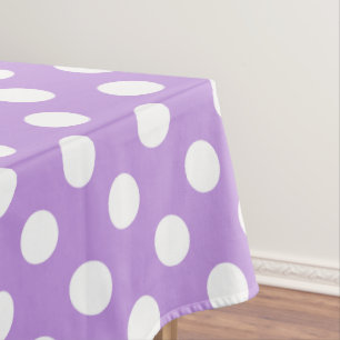Weißpolka-Punkte auf Lila Tischdecke