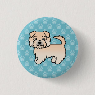 Weizenfarbener Norfolk Terrier Hund auf Blau Button