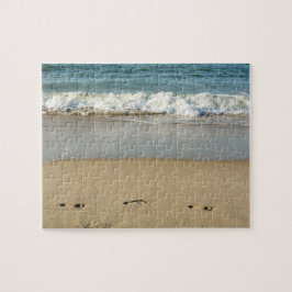 Welle und Fußabdrücke -