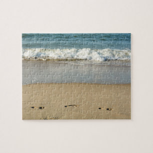 Welle und Fußabdrücke -