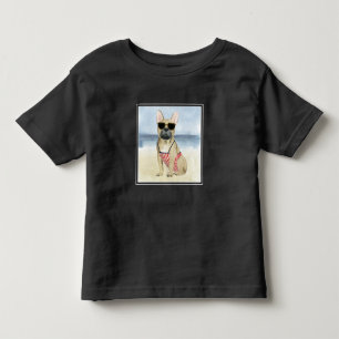Welpe des Würstchen-  in der Sonnenbrille am Kleinkind T-shirt
