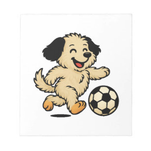 Welpe spielt Fußball Notizblock